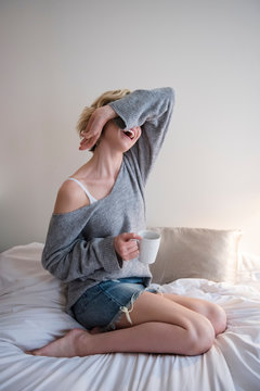 Tired woman covering face