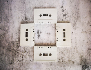 white cassette tapes on gray background