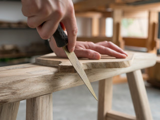 Female Carpenter working in the studio
