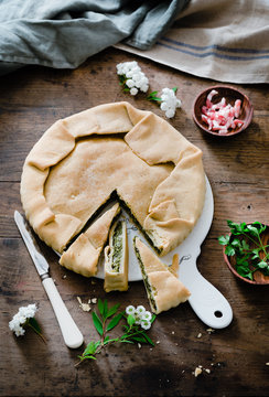 Savory pie stuffed with vegetables and bacon