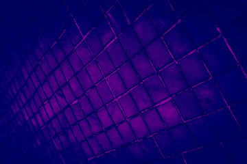 Beautiful closeup textures abstract tiles and black and purple color glass pattern wall background and art wallpaper 