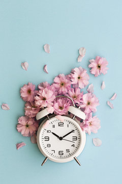 Alarm clock and cherry blossom