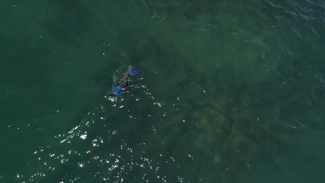 Aerial view of person swimming. Video recorded in Vila Velha, Espirito Santo, 2019.