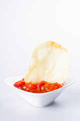 Potato Cips and ketchup and tomato sauce 