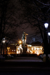 Russian statue of the Bronze Horseman in the heart of Saint Petersburg by night with view towards Menschikow Palais (St. Petersburg, Russia, Europe)