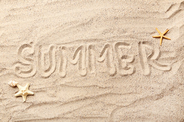 Word Summer with starfishes on beach sand