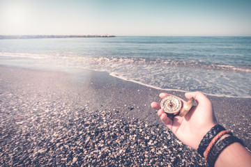 compass next to the mediterranean sea