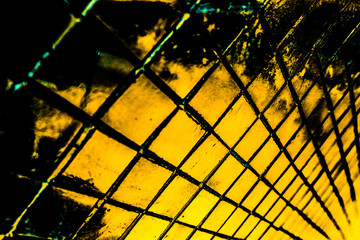 Beautiful closeup textures abstract tiles and black gold and yellow color glass pattern wall background and art wallpapers