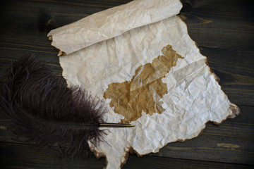 map of slovenia on vintage paper with old pen on the wooden texture desk