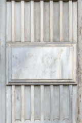 Marble wall with metal plates