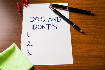 Text sign showing Do S And Dont S. Business photo showcasing Rules or customs concerning some...