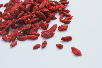 Dry goji berries on white background. Dry fruits. 