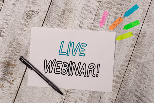 Handwriting text Live Webinar. Conceptual photo presentation lecture or seminar transmitted over Web Plain note paper and line arrow stickers with pen above the wooden table