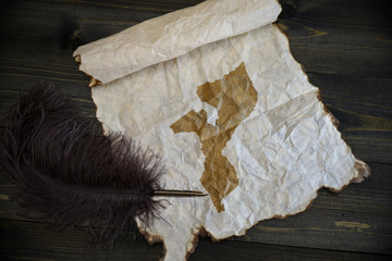 map of mozambique on vintage paper with old pen on the wooden texture desk