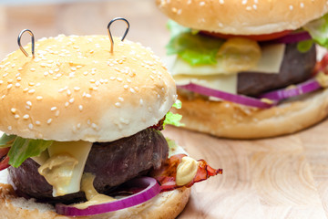 still life of beef burger with cheese