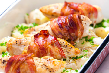 still life of poultry roulade with bacon