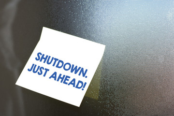 Conceptual hand writing showing Shutdown Just Ahead. Concept meaning closing factory business...