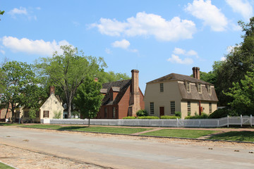 An empty street with colonial houses and trees in the summer, Virginia, USA