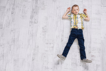 boy lying on floor