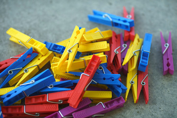 Colorful Plastic Clothespins Scattered