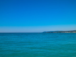 Blue water of Tyrrhenian sea in Vada, Tuscany, Italy.