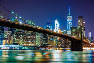 Fototapeta na wymiar New York City - Manhattan and Brooklyn Bridge at night