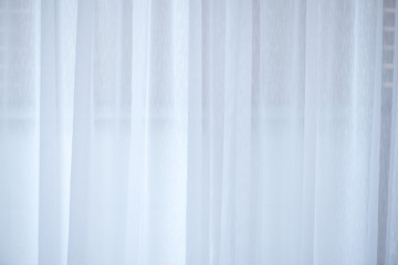 white airy sheer curtains background