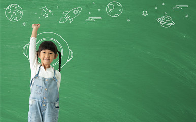 A little asian girl happy smiling  imagination with learning science technology.