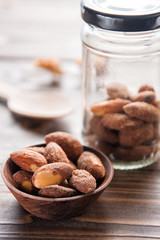 almond nut in a bowl on wooden table