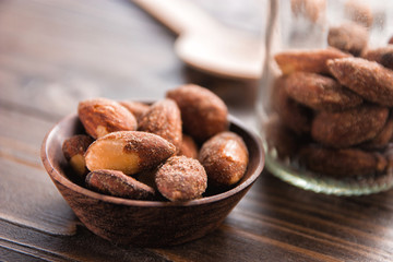 almond nut in a bowl on wooden table