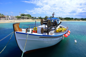 Obraz premium Photo of traditional fishing boat in picturesque island of Naxos, Cyclades, Greece