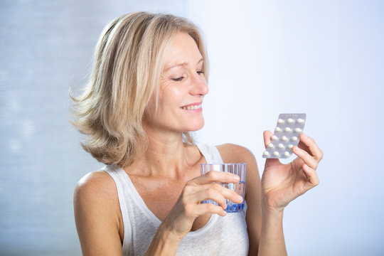 A menopausal woman using hrt