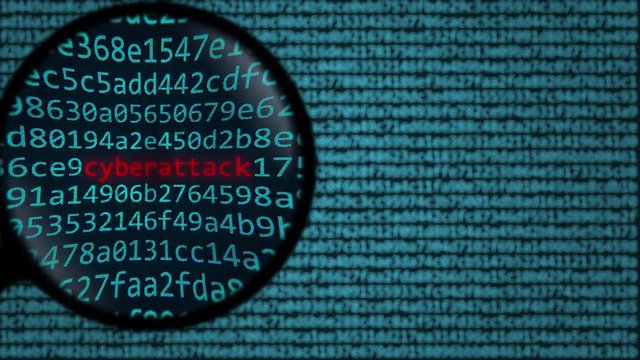 Magnifying glass discovers cyberattack word on computer screen