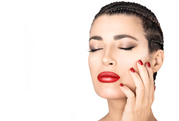 Beautiful young woman with red lips and nails. Beauty Makeup and Nail Art concept