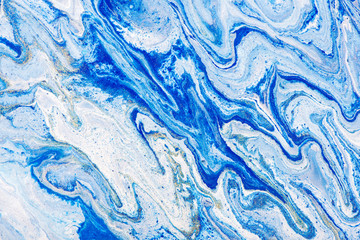 Abstract colorful background. Mixing paints. Modern art. Marble texture