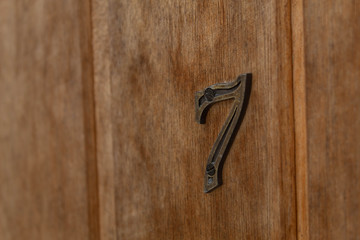 seven in wood door