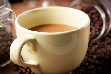 image of coffee cup on wood