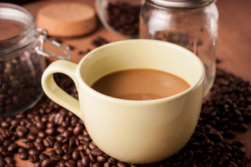 Obraz na płótnie Canvas image of coffee cup on wood
