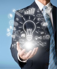 Businessman and  analytics symbol on  background