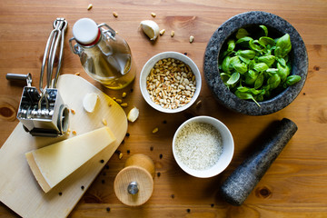 topview of Ingredients for pesto genovese with Tools for preparation