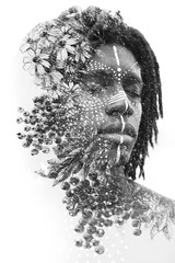 Paintography. Double exposure portrait of an african american man with closed eyes and face paint combined with hand made ink drawings with floral motifs, black and white