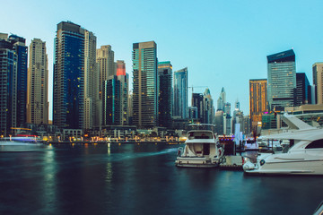 Fototapeta na wymiar Dubai Marina district at sunset time. Dubai at May 2019.