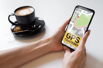 GPS tracking map on smartphone screen.  Global positioning system, navigation concept.