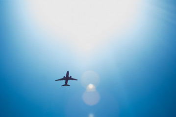 Sunny blue sky with plane