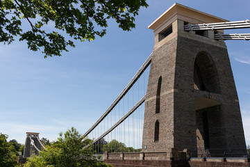 BRISTOL, UK - MAY 13 : View of the Clifton Suspension Bridge in Bristol on May 13, 2019. Three unidentified people