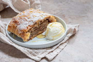 Sweet apple strudel with vanilla ice cream
