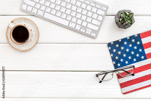Memoral day of United States of America with flag, keyboard, glasses and coffee on white background top view mockup