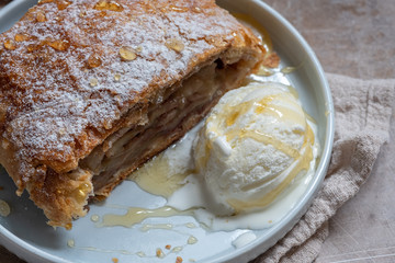 Sweet apple strudel with vanilla ice cream