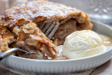 Sweet apple strudel with vanilla ice cream