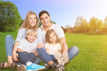 Fototapeta premium Beautiful smiling Lovely family on background
